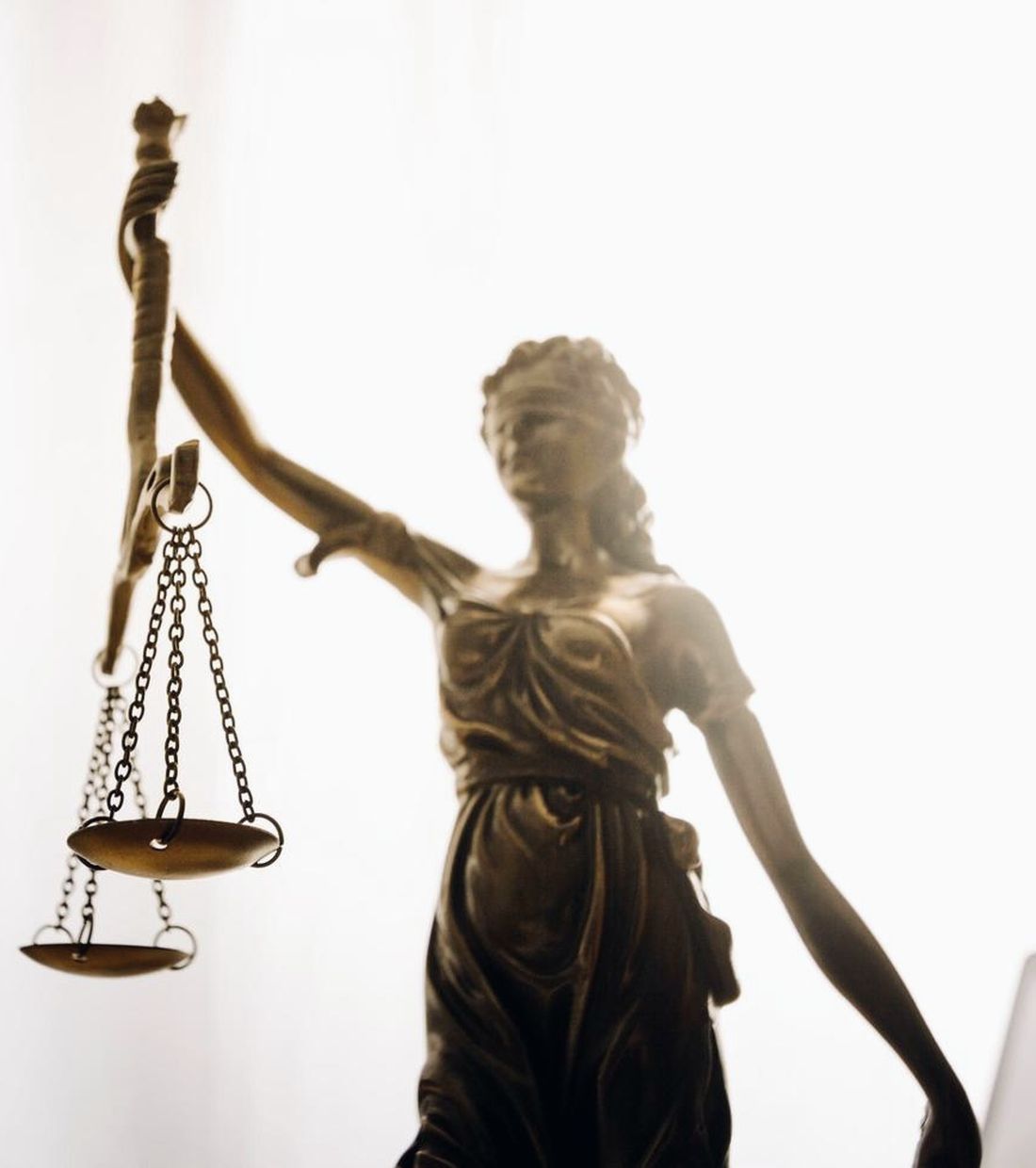 Lady Justice statue holding the scales